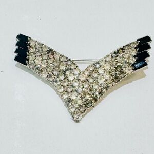 Vintage pave rhinestone/ black  Brooch. Secure clasp. Stones are clear.